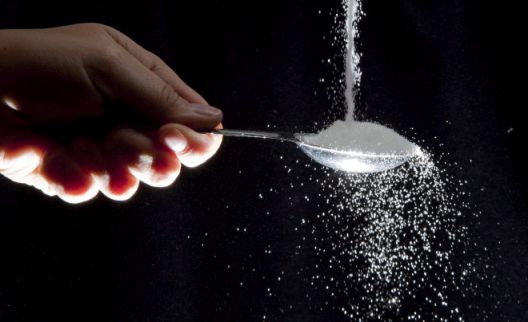 Sugar is poured on a tablespoon in a photo illustration in North Vancouver, B.C. Wednesday, Sept. 21, 2011.THE CANADIAN PRESS/Jonathan Hayward ORG XMIT: CPT110